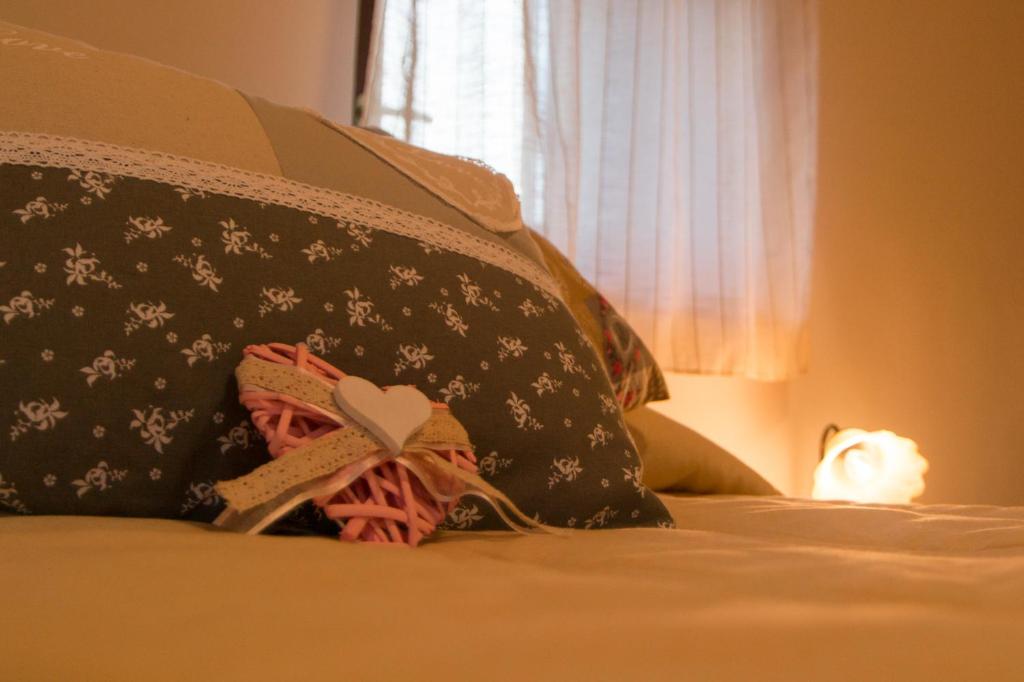 Postel nebo postele na pokoji v ubytování B&B La Pietra