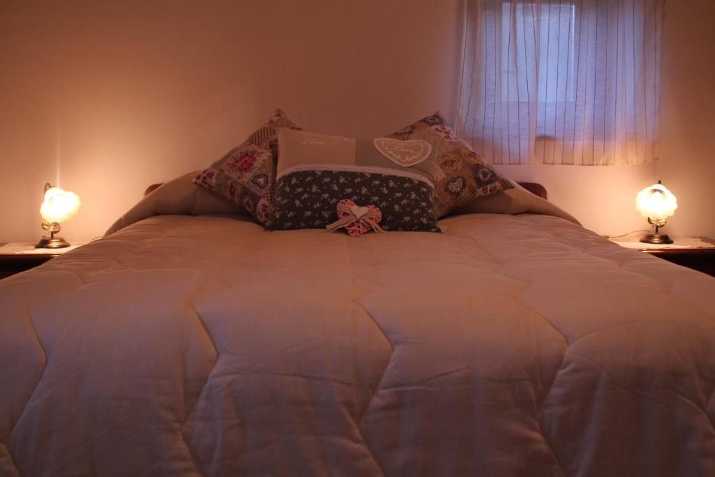Postel nebo postele na pokoji v ubytování B&B La Pietra