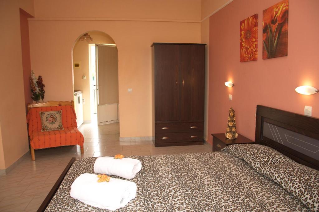 Ein Bett oder Betten in einem Zimmer der Unterkunft Athina Studios