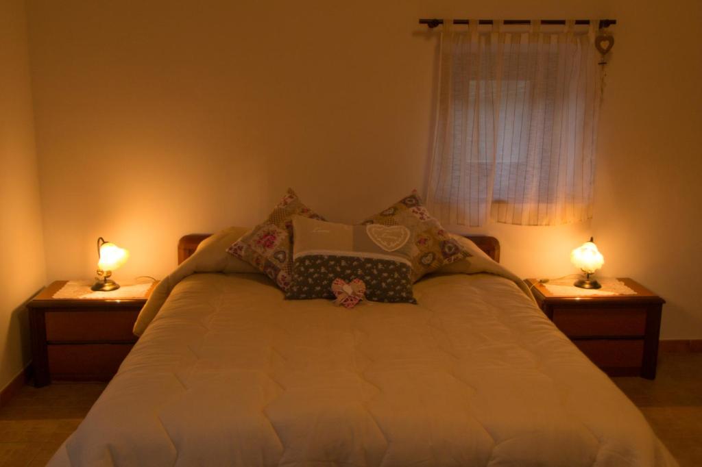 Postel nebo postele na pokoji v ubytování B&B La Pietra