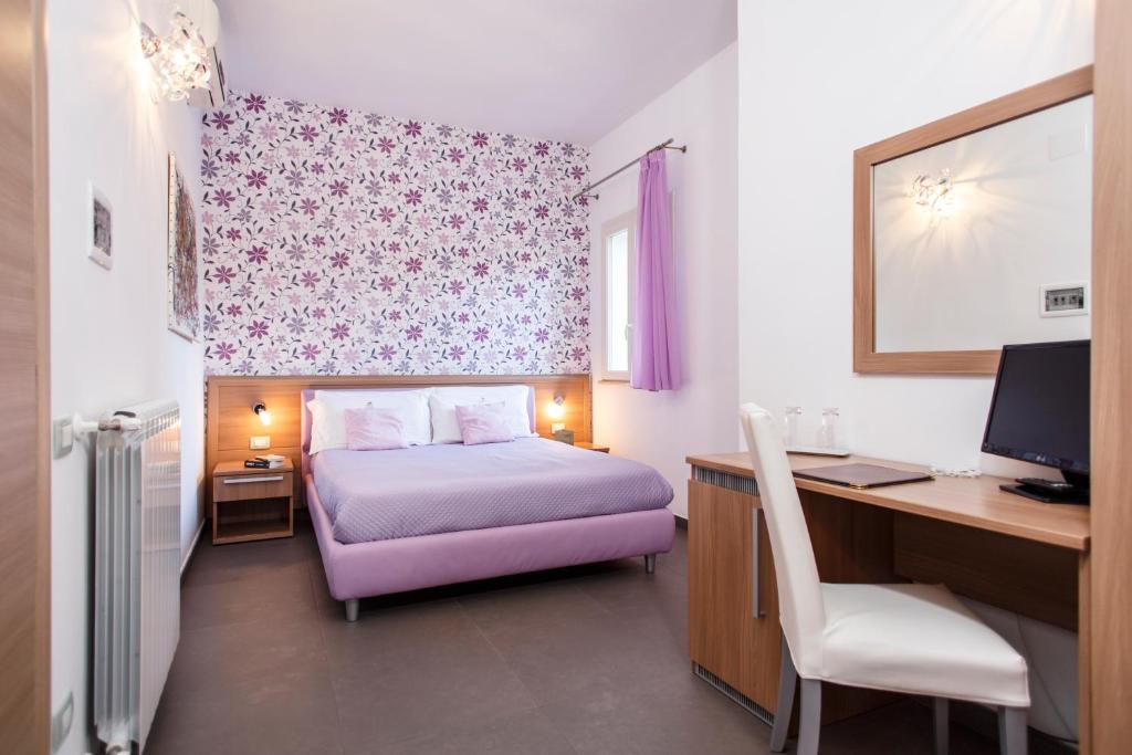 Postel nebo postele na pokoji v ubytování B&B Villa Seta