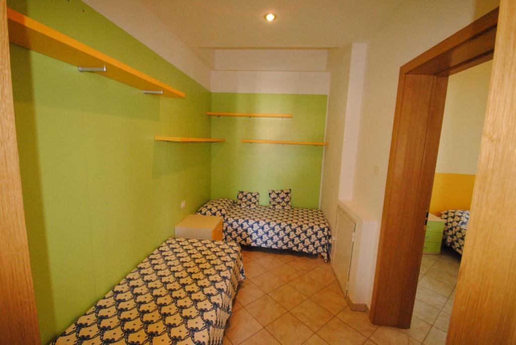 A bed or beds in a room at Villa Fiorella