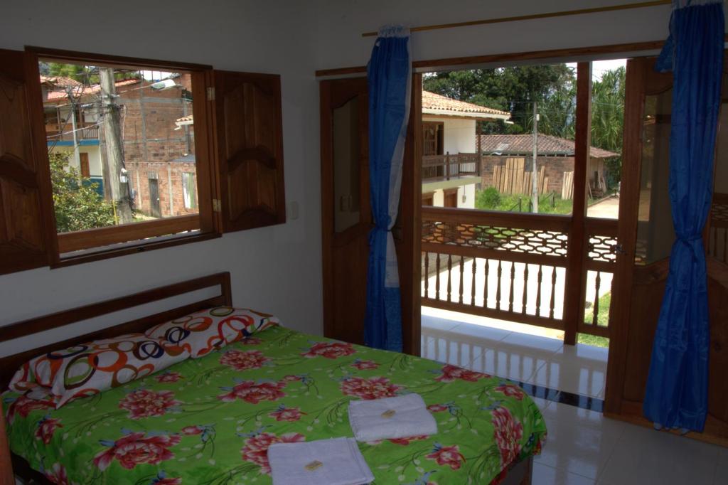 Postel nebo postele na pokoji v ubytování Hotel Internacional Jardín