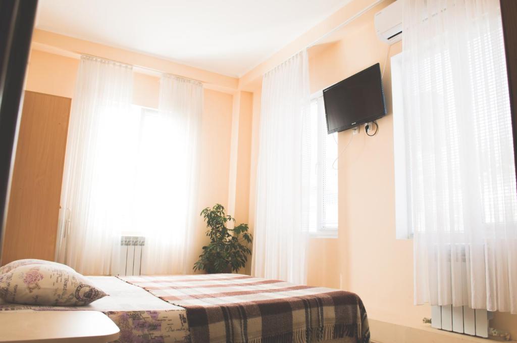 Cama o camas de una habitación en Guest House at Kirova Street