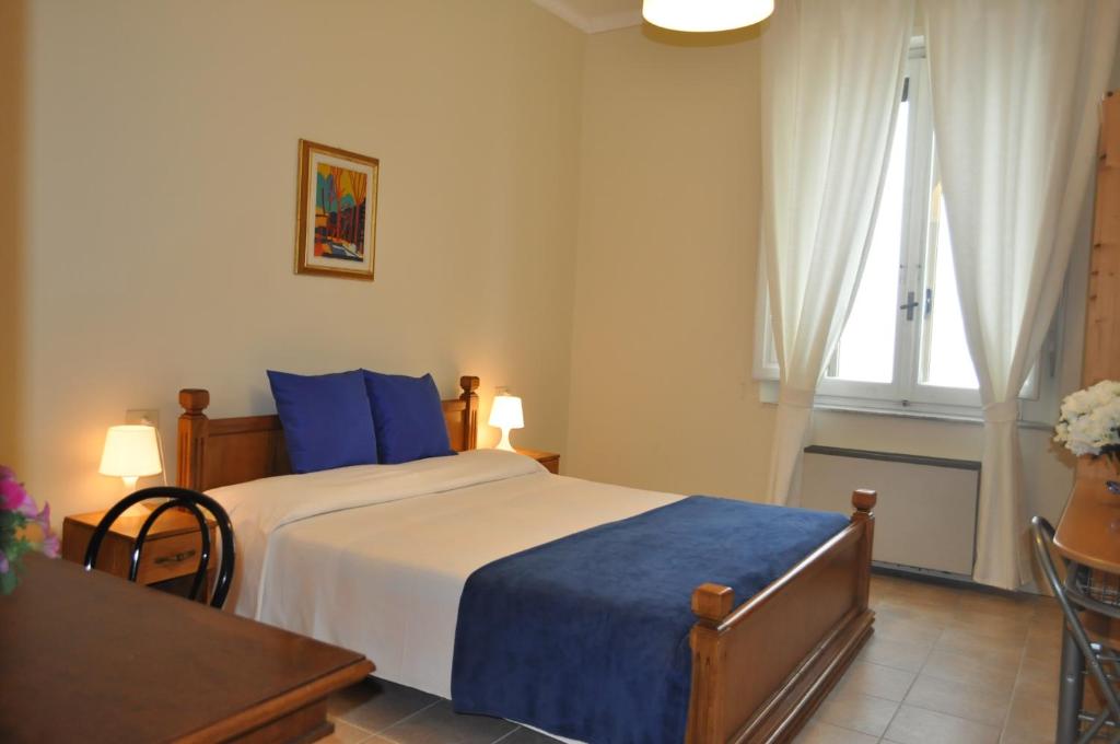 Posteľ alebo postele v izbe v ubytovaní Hotel Firenze 2000