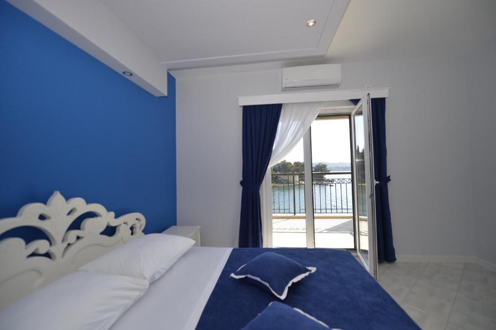 Postel nebo postele na pokoji v ubytování Pontus Luxury Apartments