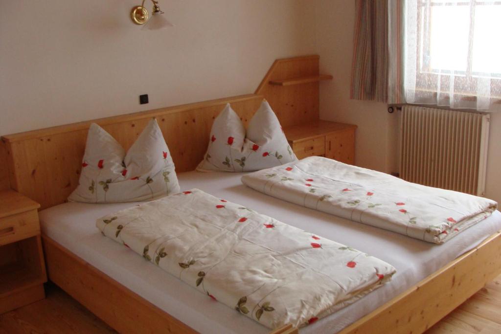 Postel nebo postele na pokoji v ubytování Hotel Messnerwirt