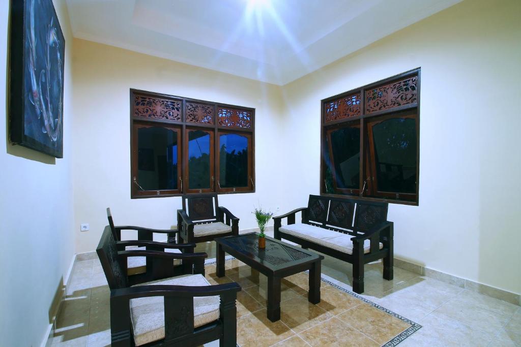 Posezení v ubytování Pondok Muwa Guest House