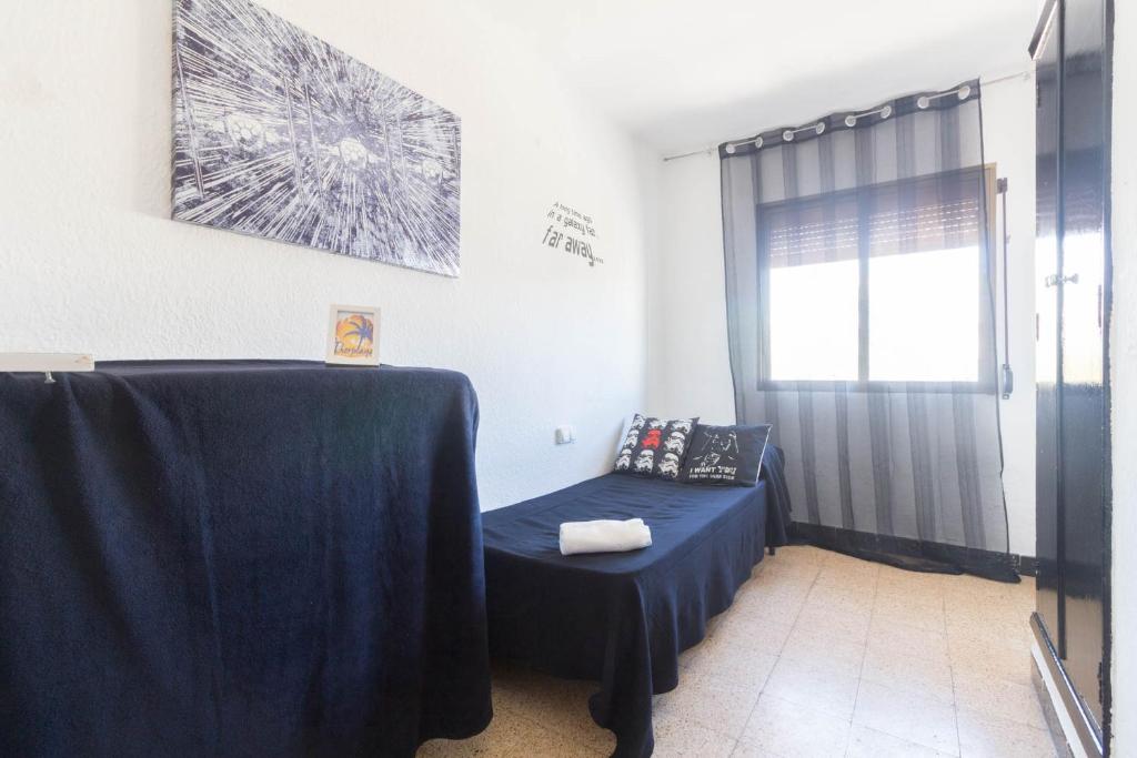 Postel nebo postele na pokoji v ubytování Capellans IBERPLAYA