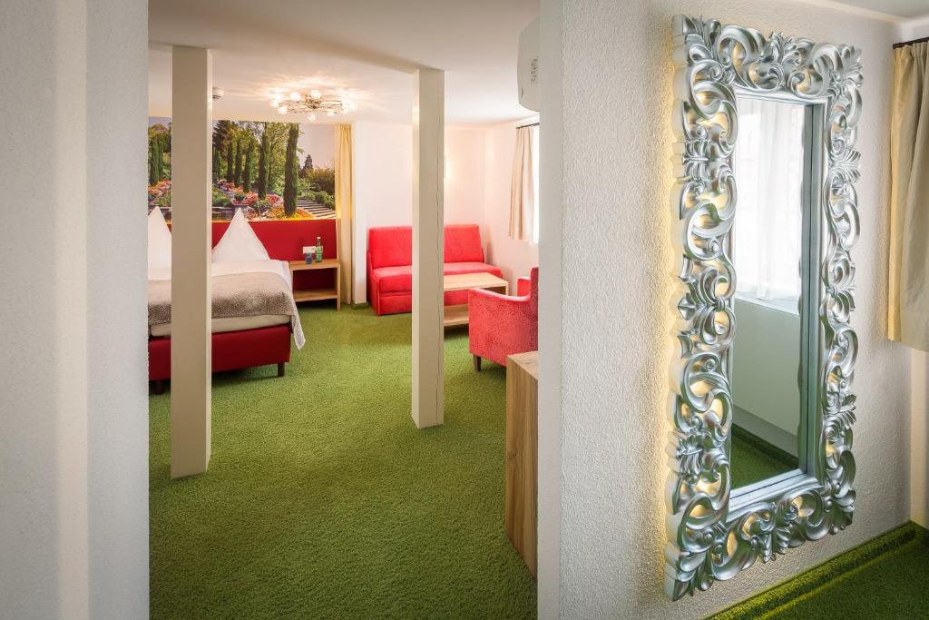 Postel nebo postele na pokoji v ubytování Hotel Alte Schule