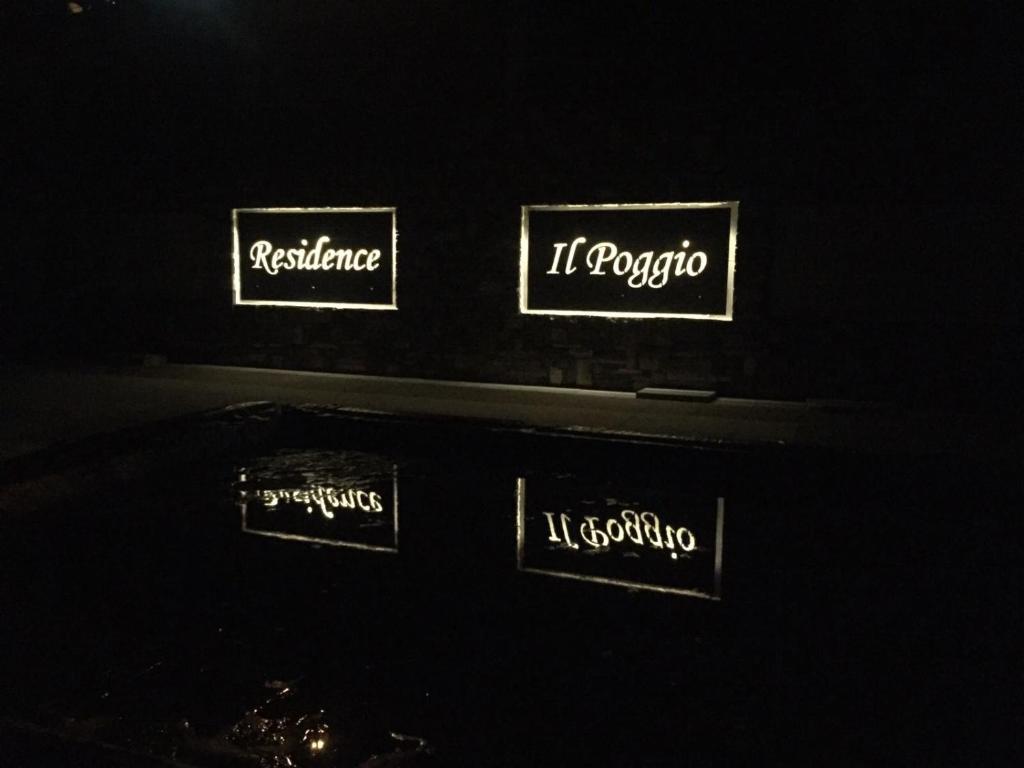Certifikát, hodnocení, plakát nebo jiný dokument vystavený v ubytování Residence Il Poggio