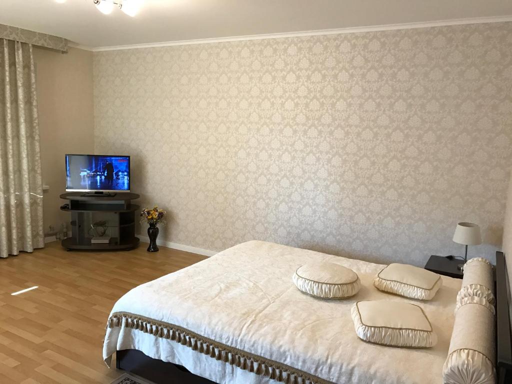 Кровать или кровати в номере Pretty Apartment