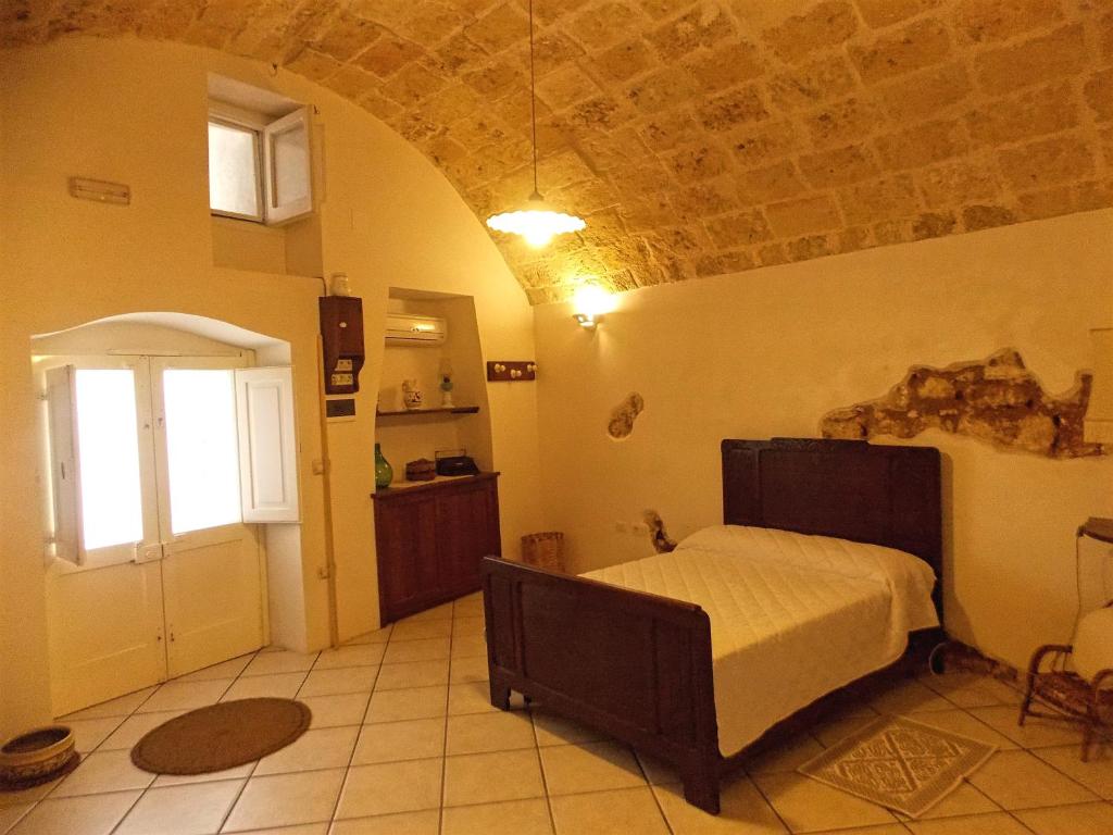 Postel nebo postele na pokoji v ubytování A casa du 'Ntunucciu