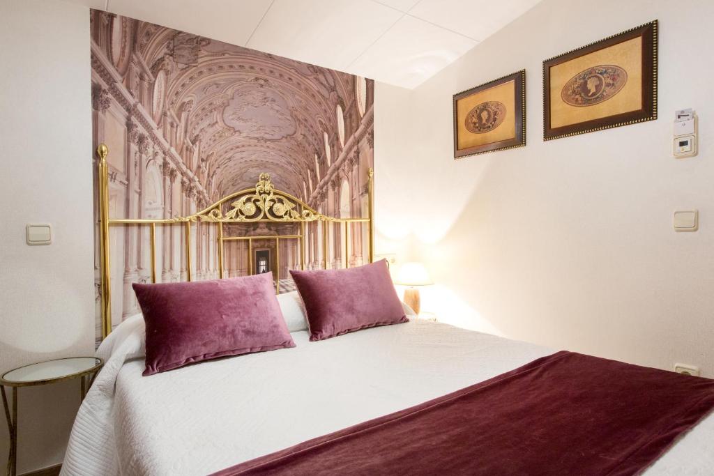 Postel nebo postele na pokoji v ubytování Hotel Villa San Jorge