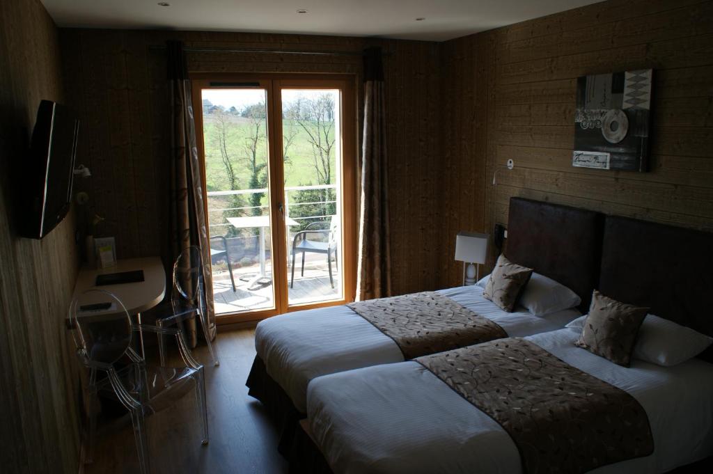 Postel nebo postele na pokoji v ubytování Hotel Blanc