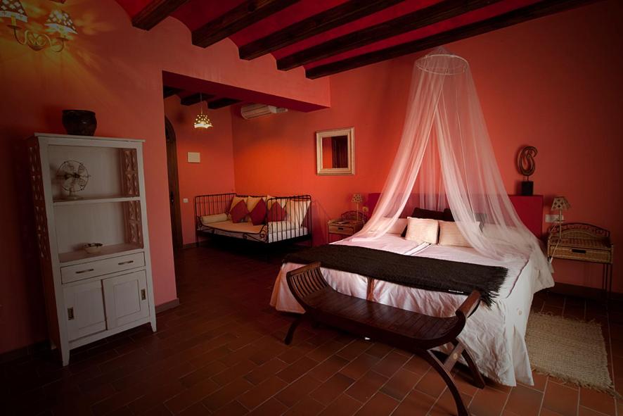 Кровать или кровати в номере L'Alcova Turisme Rural