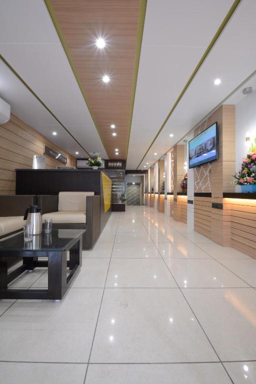 TV a/nebo společenská místnost v ubytování Hotel One Up