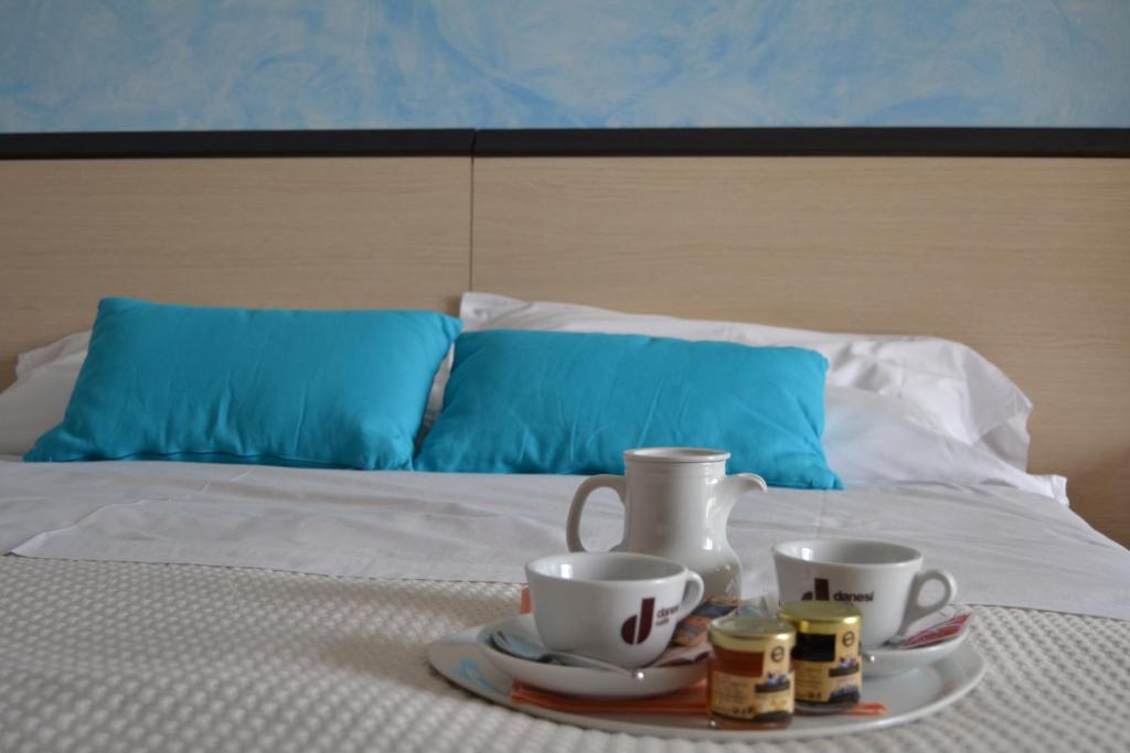 Posteľ alebo postele v izbe v ubytovaní Hotel La Siesta