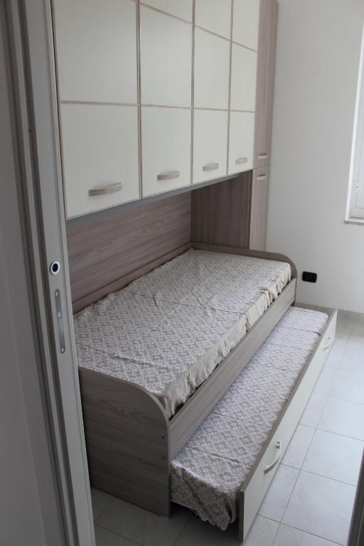 A bed or beds in a room at Villa Benedetta