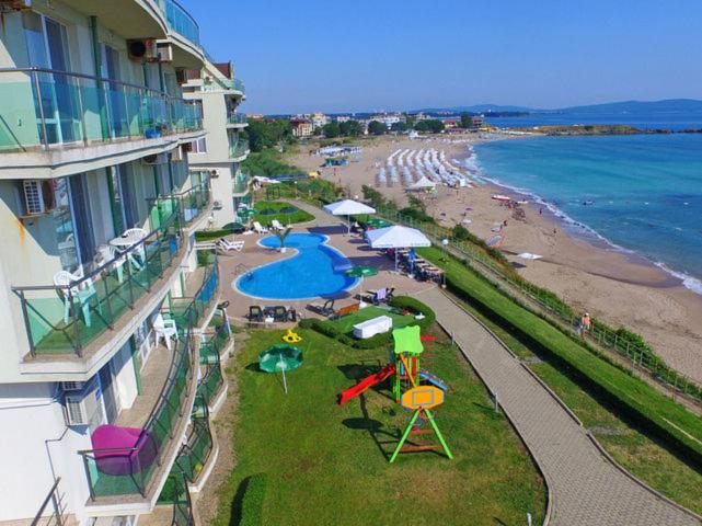 a view of a beach with a hotel and a resort at Lozenetz Beach Apartments in Lozenets