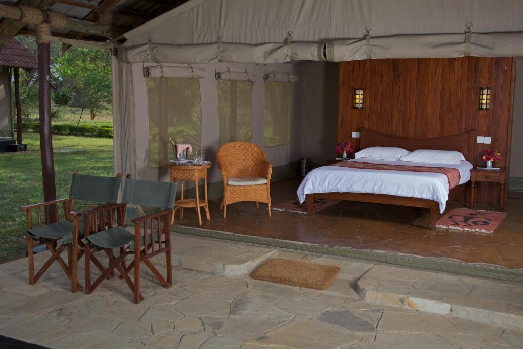 Postel nebo postele na pokoji v ubytování Ashnil Aruba Lodge