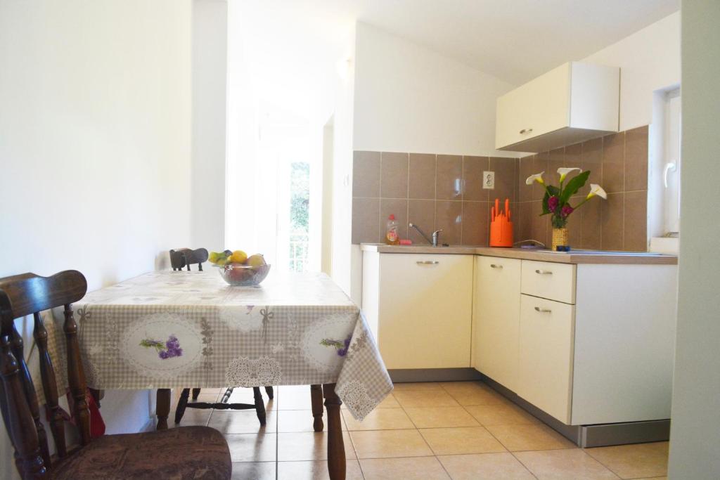 Kuchyňa alebo kuchynka v ubytovaní Marin Apartment