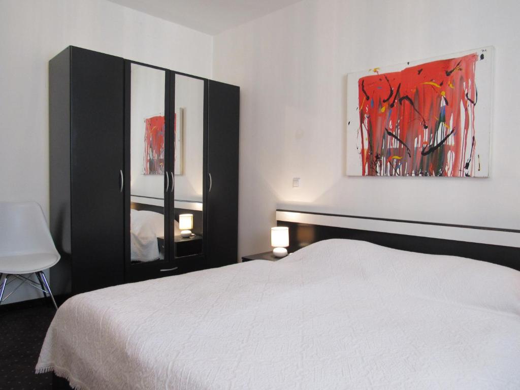Postel nebo postele na pokoji v ubytování Guest House Klaudija