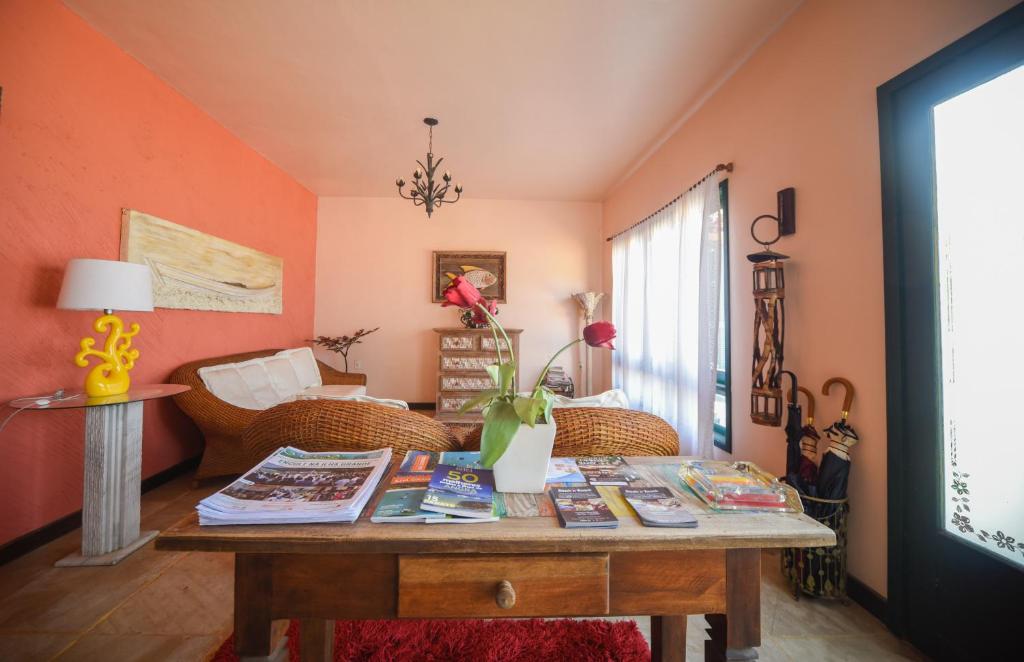 Cama ou camas em um quarto em Pousada Solar da Praia