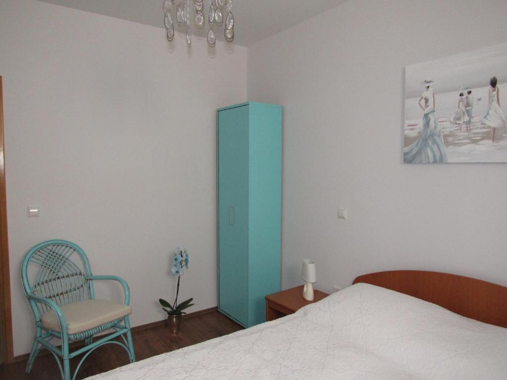 Postel nebo postele na pokoji v ubytování Guest House Klaudija