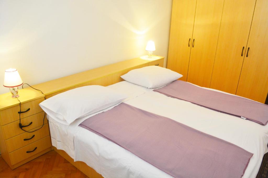 Posteľ alebo postele v izbe v ubytovaní Marin Apartment