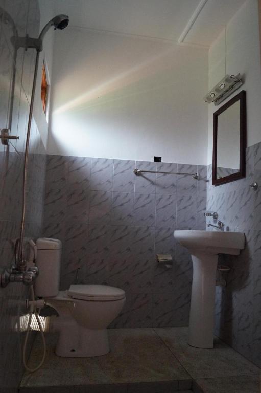 Koupelna v ubytování Embiente Guest House