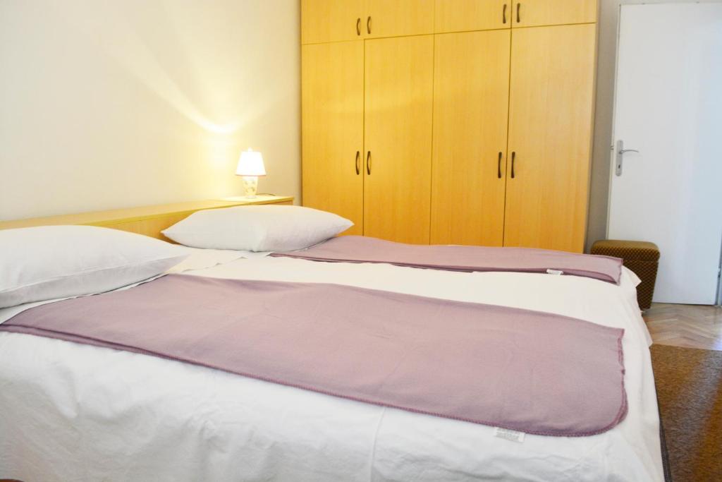 Posteľ alebo postele v izbe v ubytovaní Marin Apartment