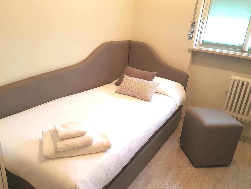 Postel nebo postele na pokoji v ubytování Hotel Europa