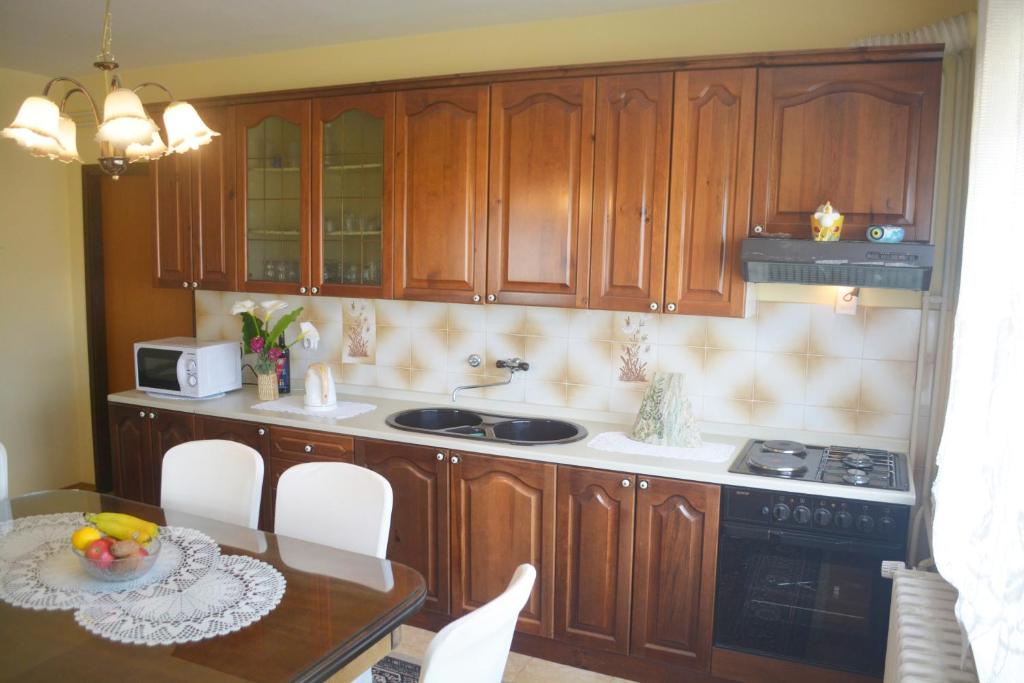 Kuchyňa alebo kuchynka v ubytovaní Marin Apartment