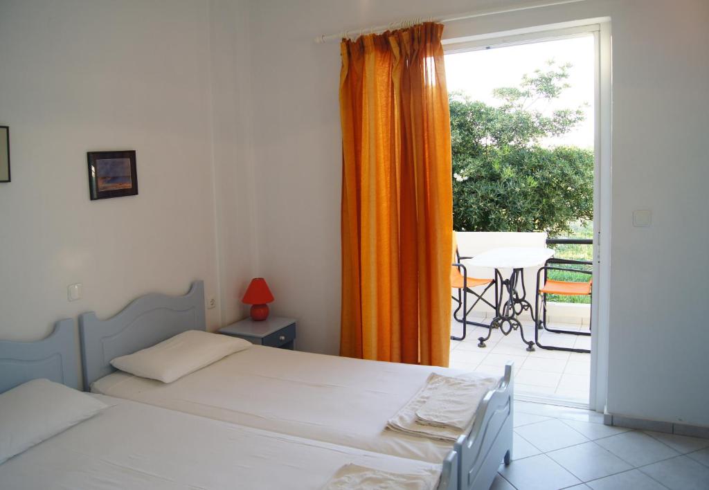 Postel nebo postele na pokoji v ubytování Silvi Mari Apartments