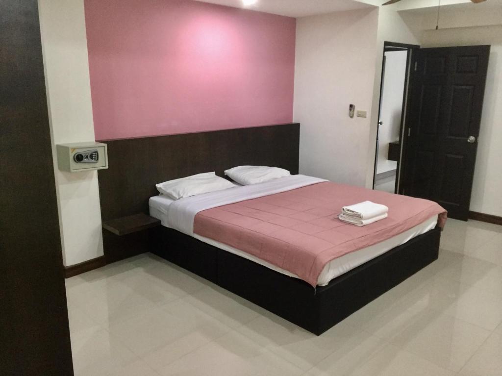 Postel nebo postele na pokoji v ubytování Shanghai Guesthouse Monna bar