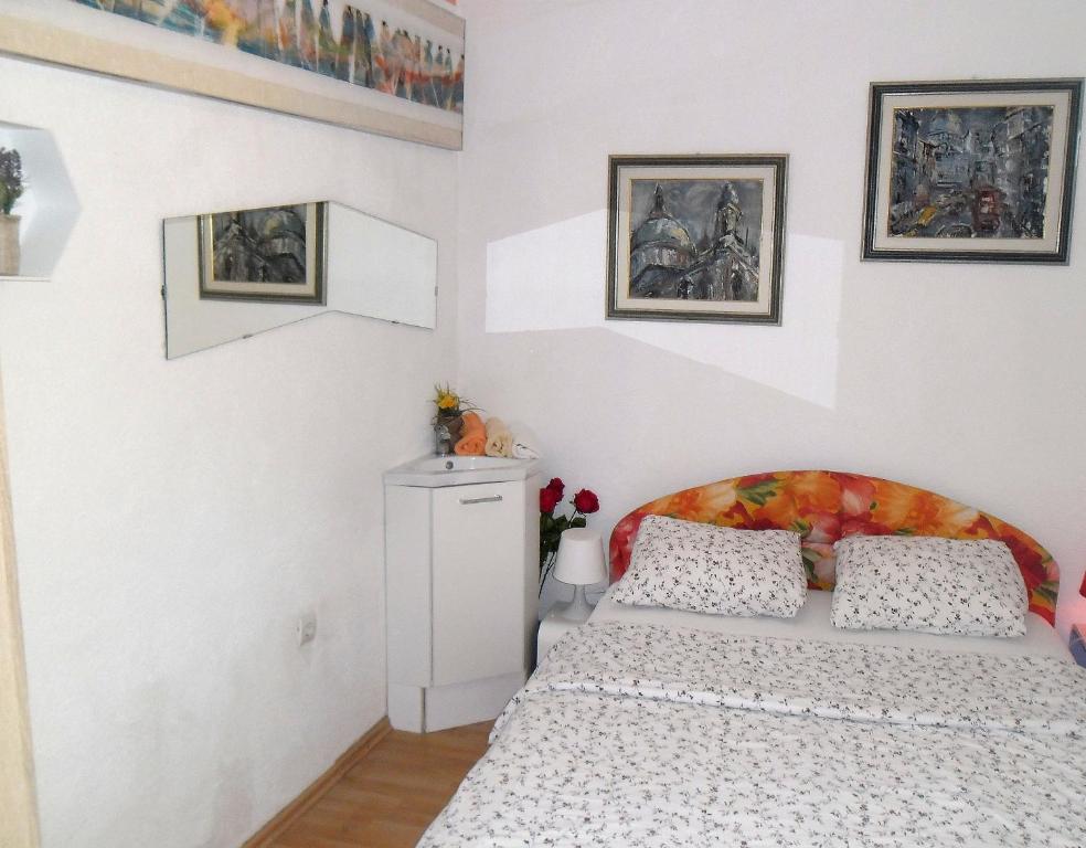 Posteľ alebo postele v izbe v ubytovaní Apartments Kestenovi Dvori