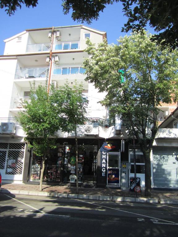 a building on the corner of a street at Central Guesthouse in Nesebar