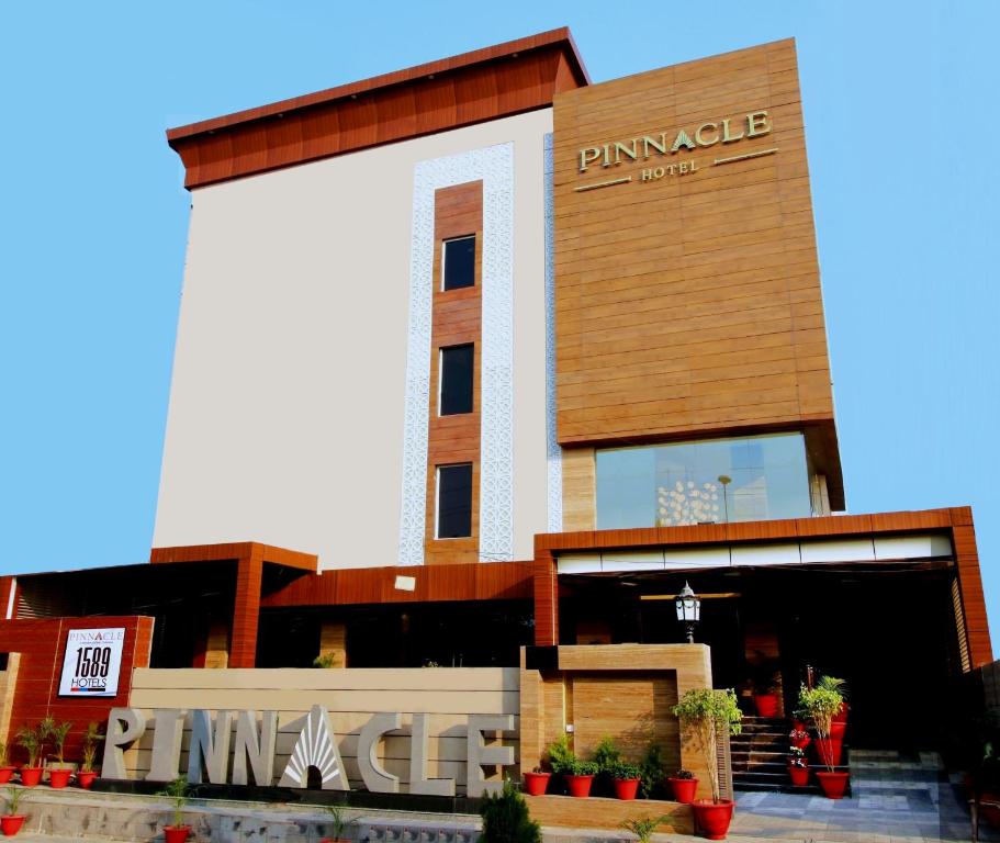 a rendering of the entrance to a puma building at Pinnacle by Click Hotels, Lucknow in Lucknow
