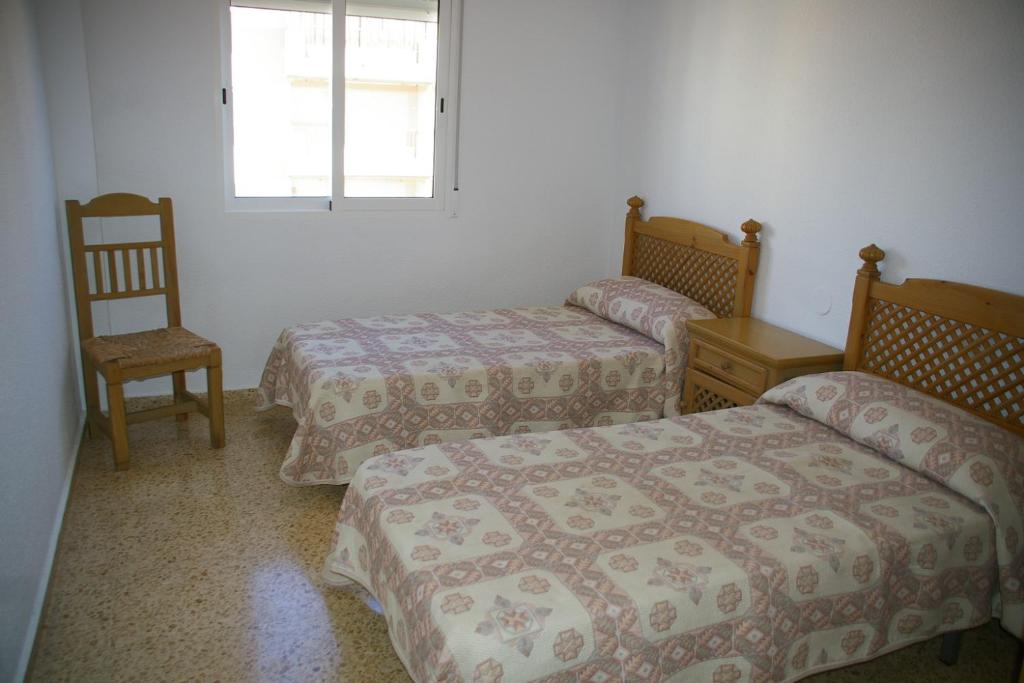 Кровать или кровати в номере Madeira Superior Orangecosta