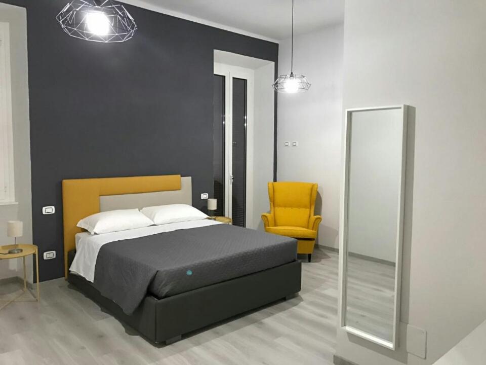 A bed or beds in a room at Sensation House