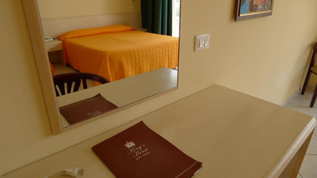 Postel nebo postele na pokoji v ubytování King's House Hotel Resort