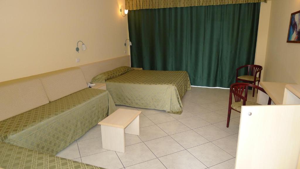 Posezení v ubytování King's House Hotel Resort