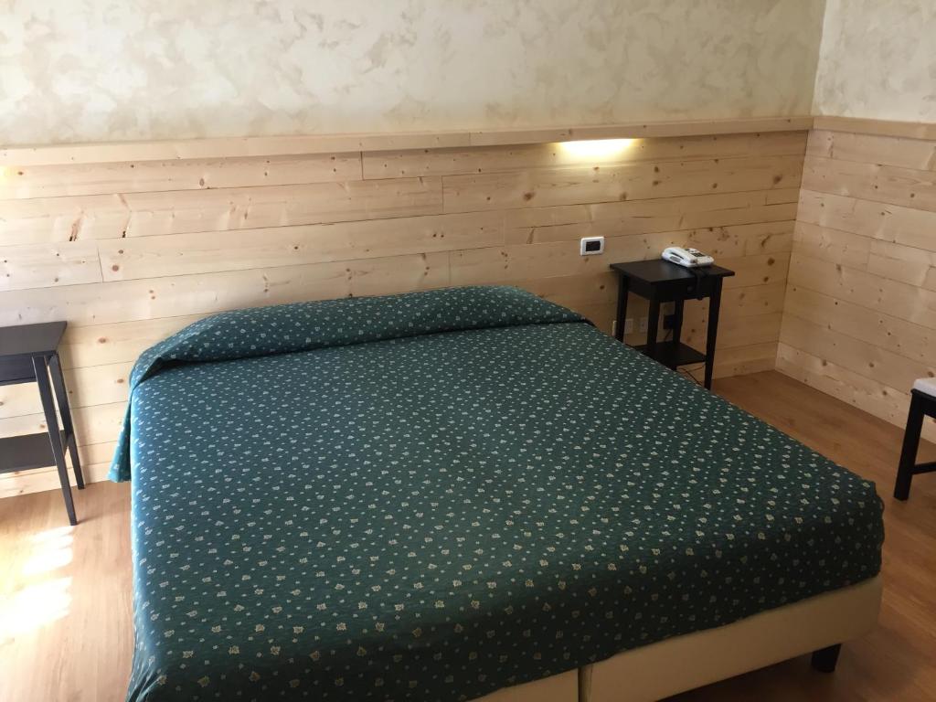 Postel nebo postele na pokoji v ubytování Al Garibaldino