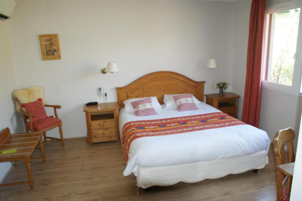 Postel nebo postele na pokoji v ubytování Hotel Blanc