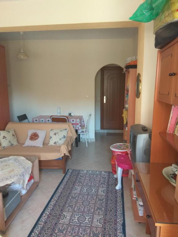 Łóżko lub łóżka w pokoju w obiekcie Ioannis Stagkonis Apartment