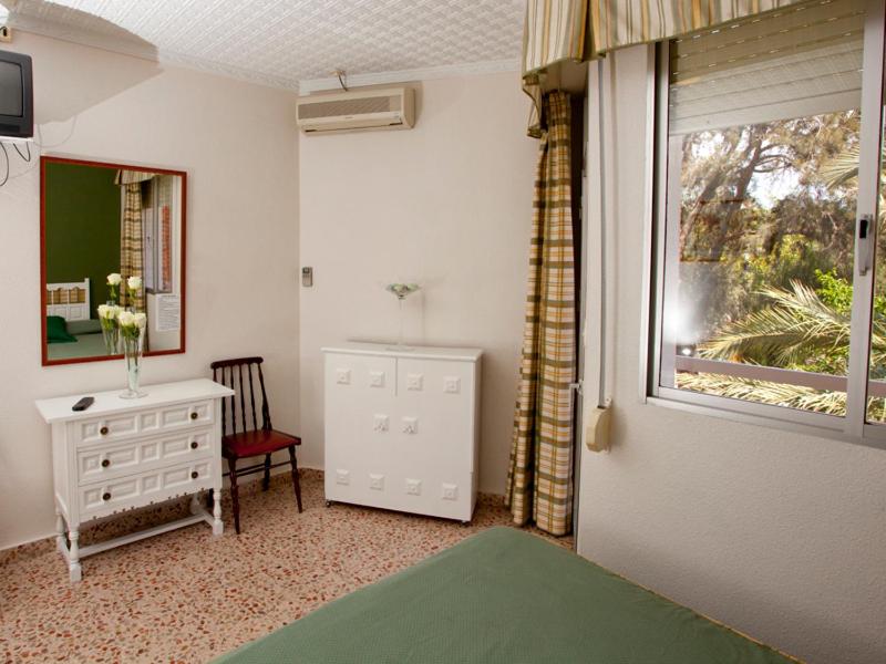 Postel nebo postele na pokoji v ubytování Hotel Costa