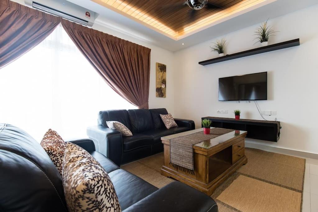 Posezení v ubytování Palm Armada Residence Free Parking and Netflix