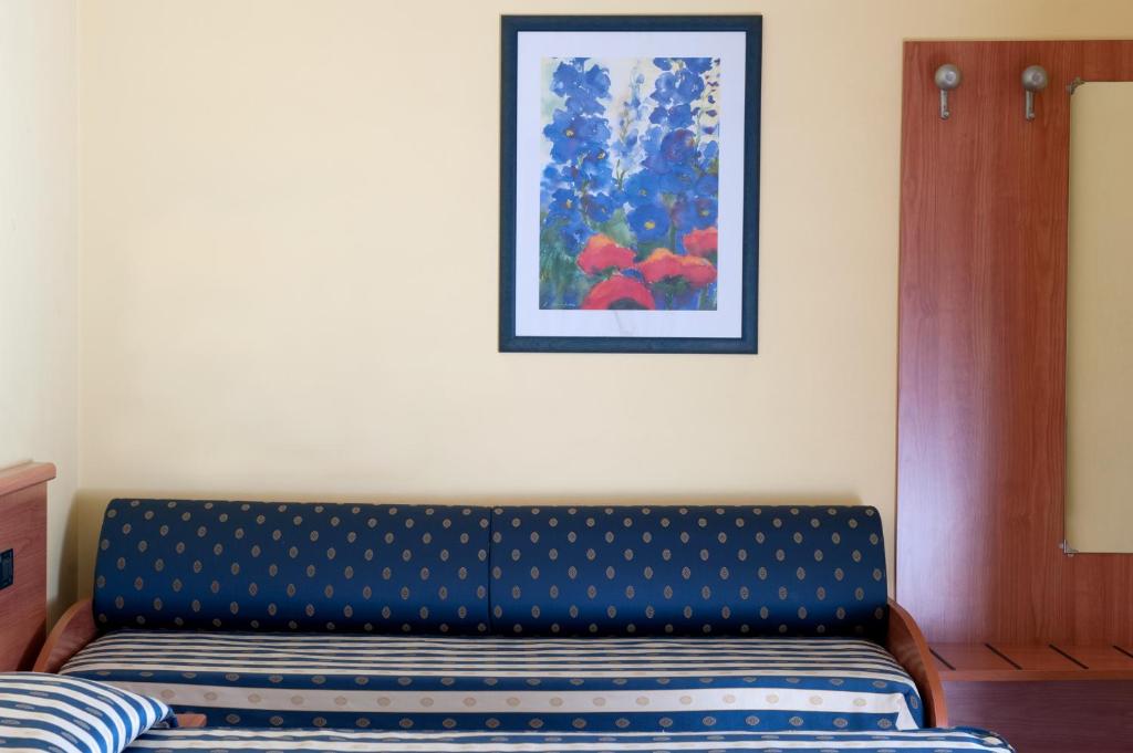 Postel nebo postele na pokoji v ubytování Hotel Blue Ribbon