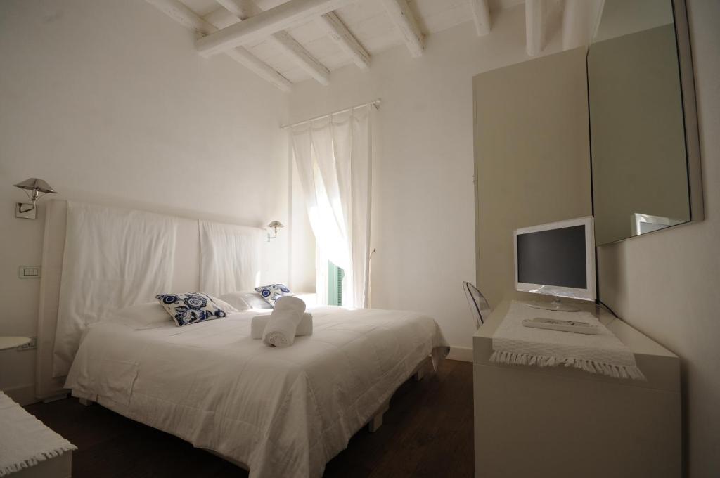 Televízia a/alebo spoločenská miestnosť v ubytovaní B&B Suite Home Trani